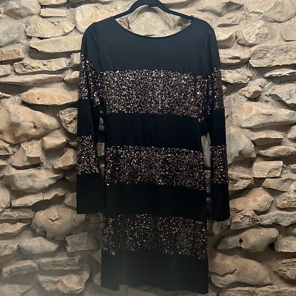 Long sleeved, lined dress with striped sequin detail. Another good NYE dress!